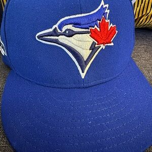 Vibrant Blue Baseball Cap with Red Maple Leaf
